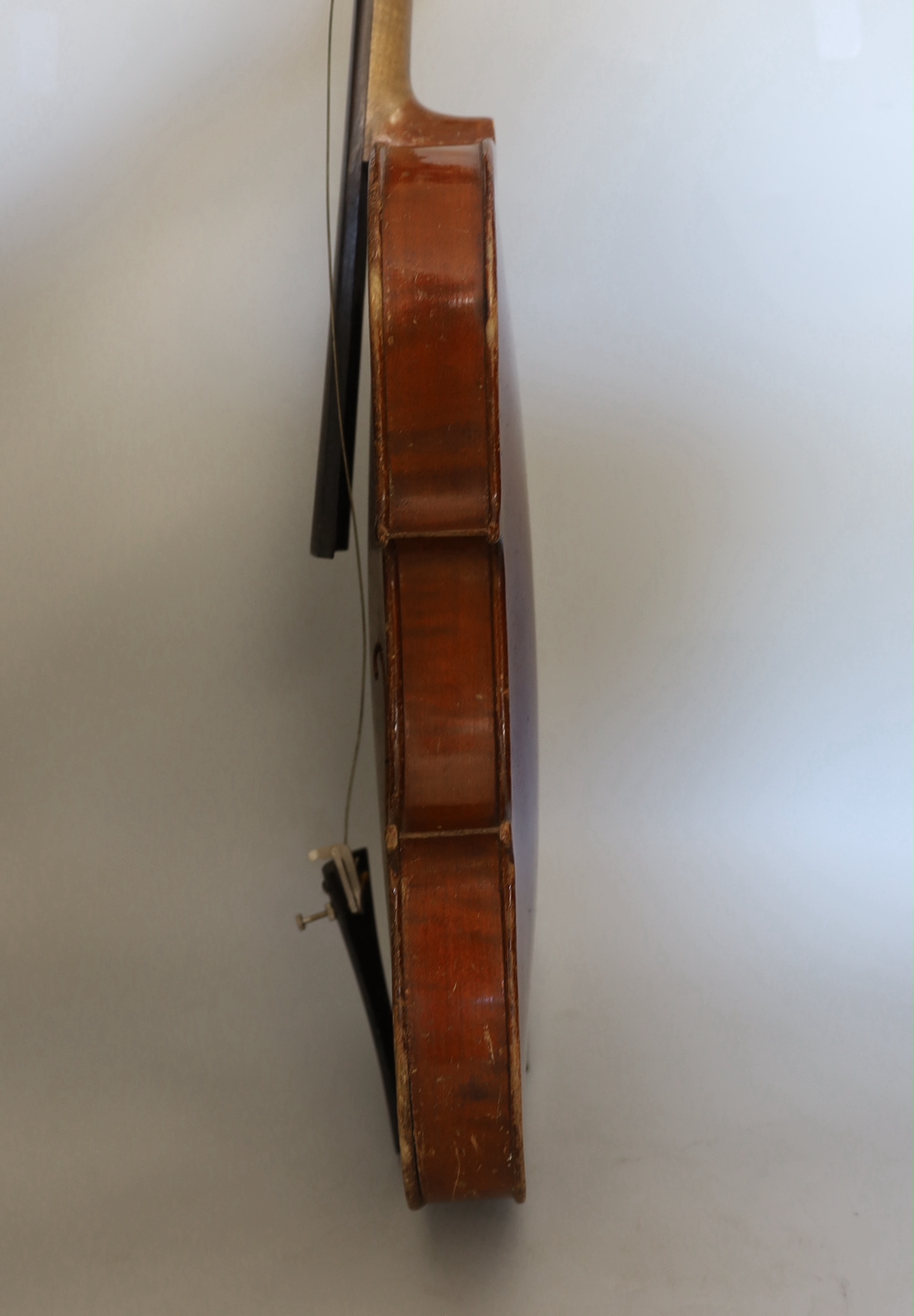 A full sized German violin and case, violin 60cm long